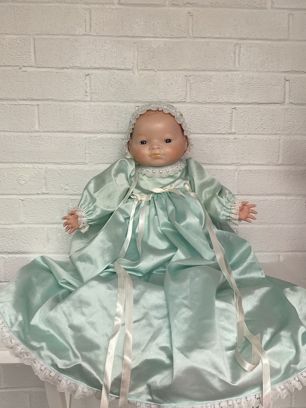 Grace S. Putnam reproduction baby doll measuring approximately 20 inches long.